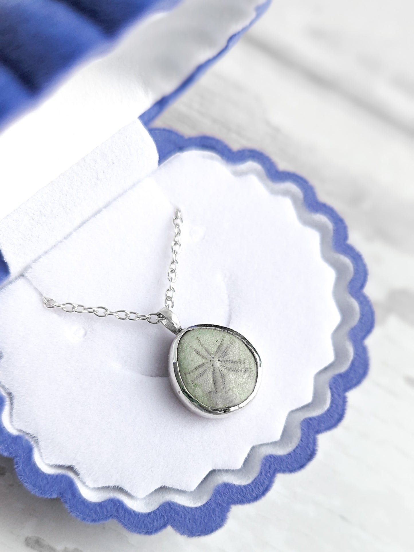 Pale green pea urchin pendant
