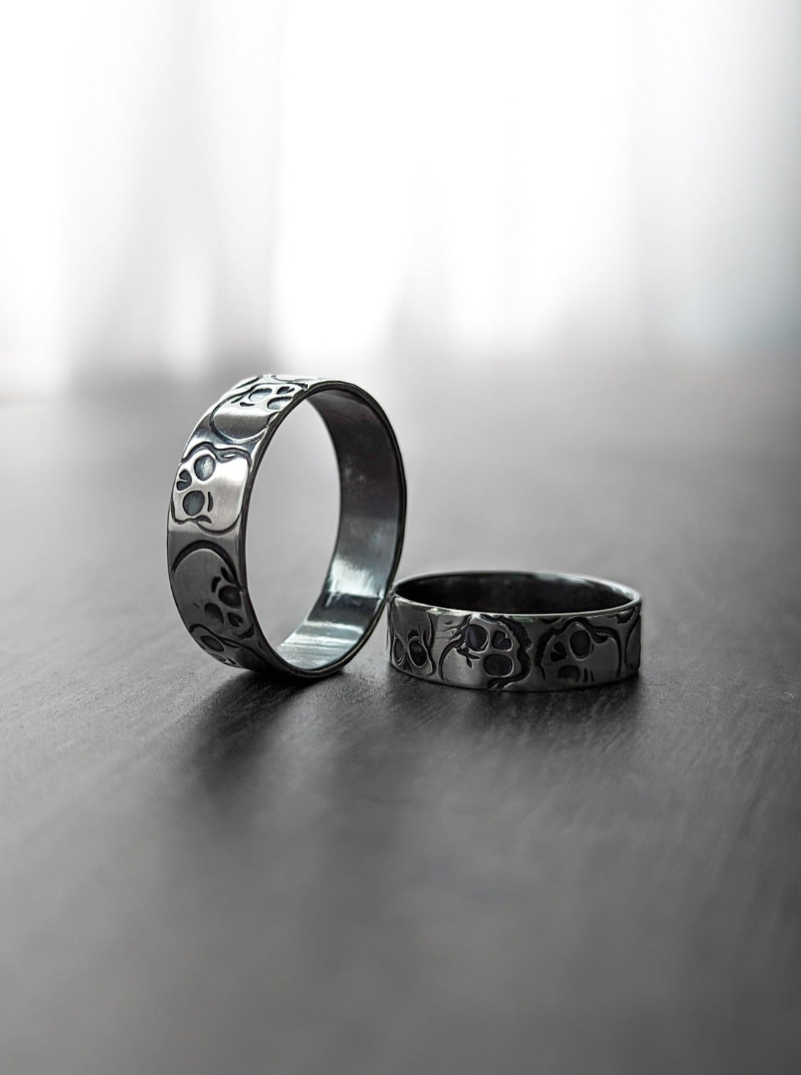Alt wedding rings in sterling silver with skulls all over