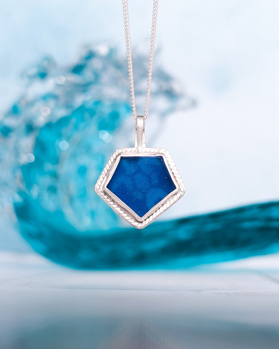 Dark ocean blue beach glass necklace with cut-out sea turtle