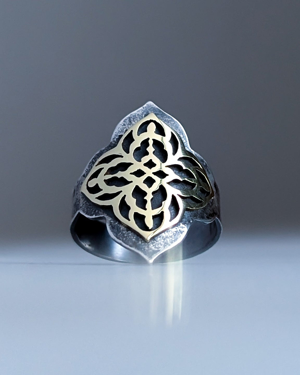 Silver and gold quatrefoil gothic saddle ring