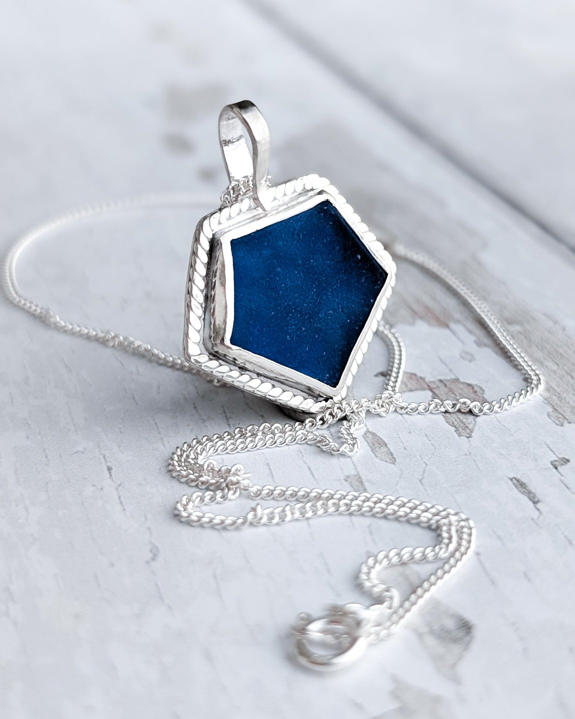 Royal blue geometric beach glass pendant with turtle silhouette