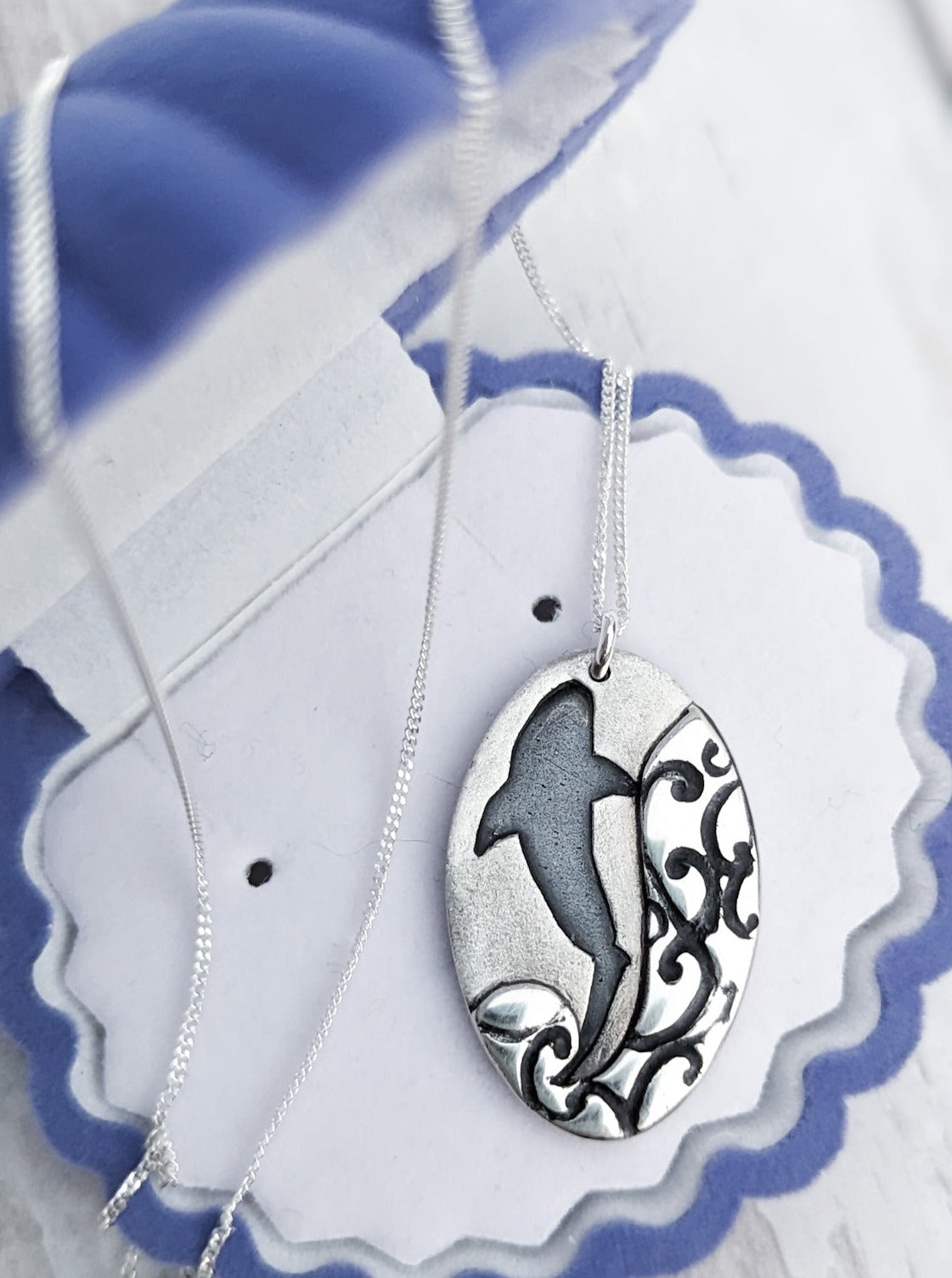 Silver shark silhouette pendant