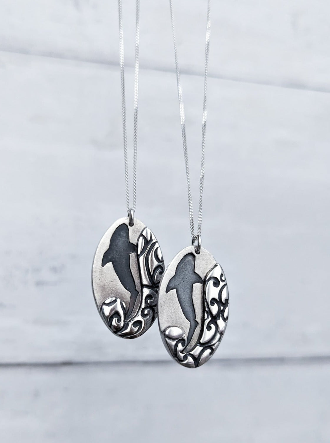 Ta moko wave detail shark pendants
