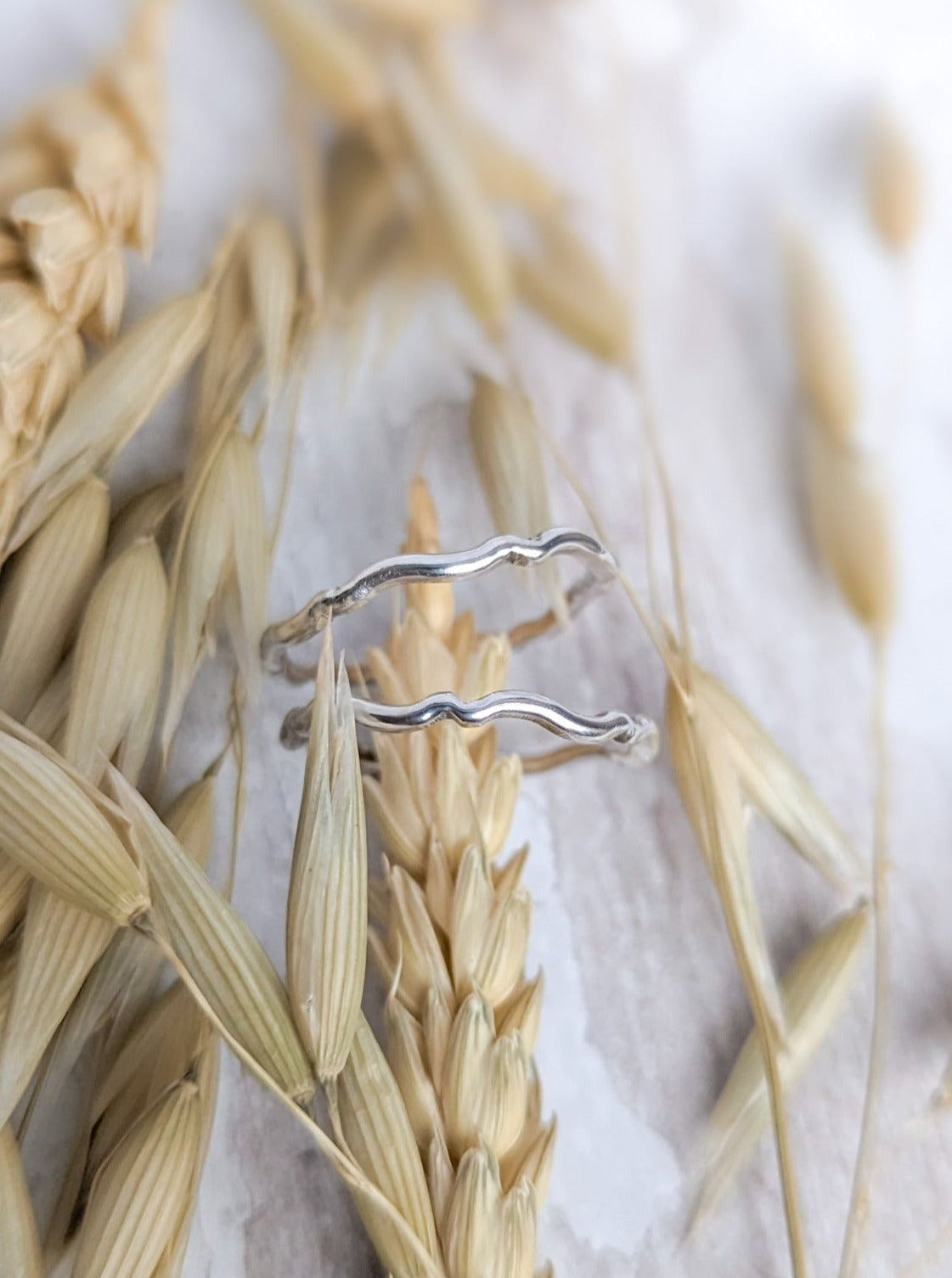 Subtle silver waves ring