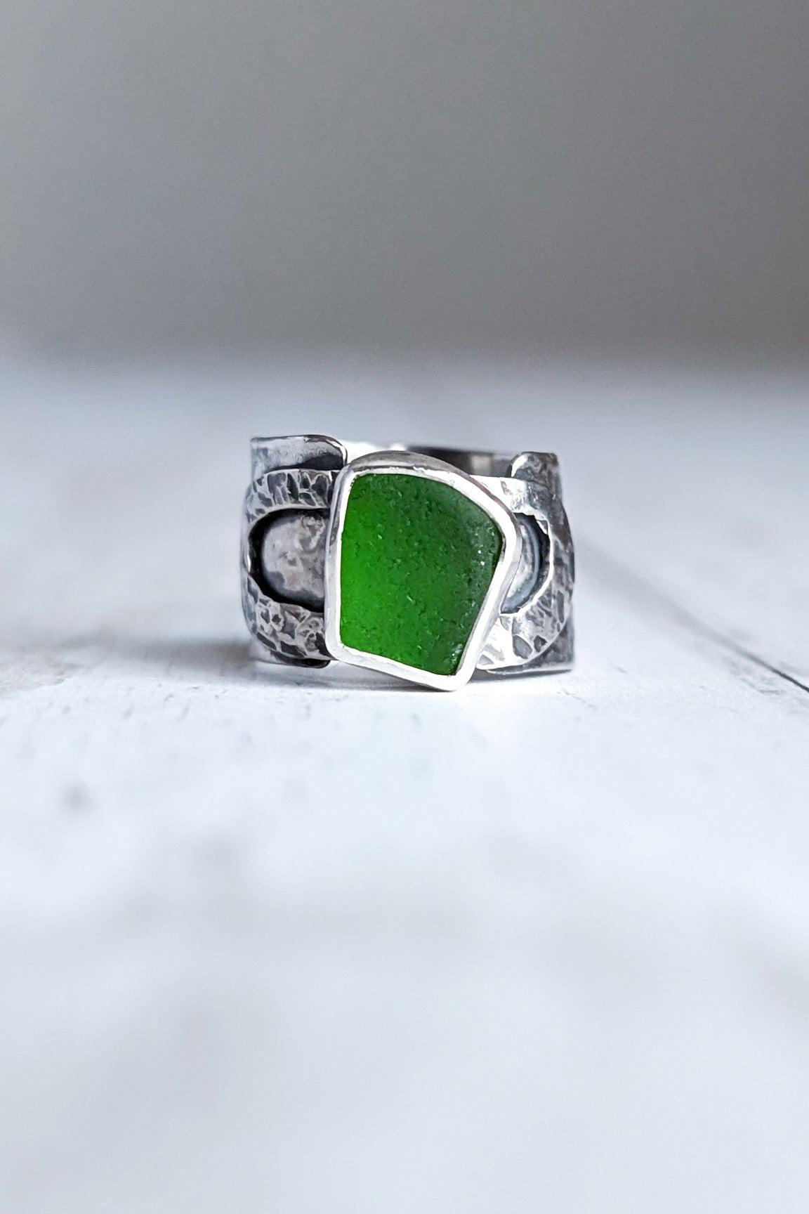 Textured silver and green sea glass ring