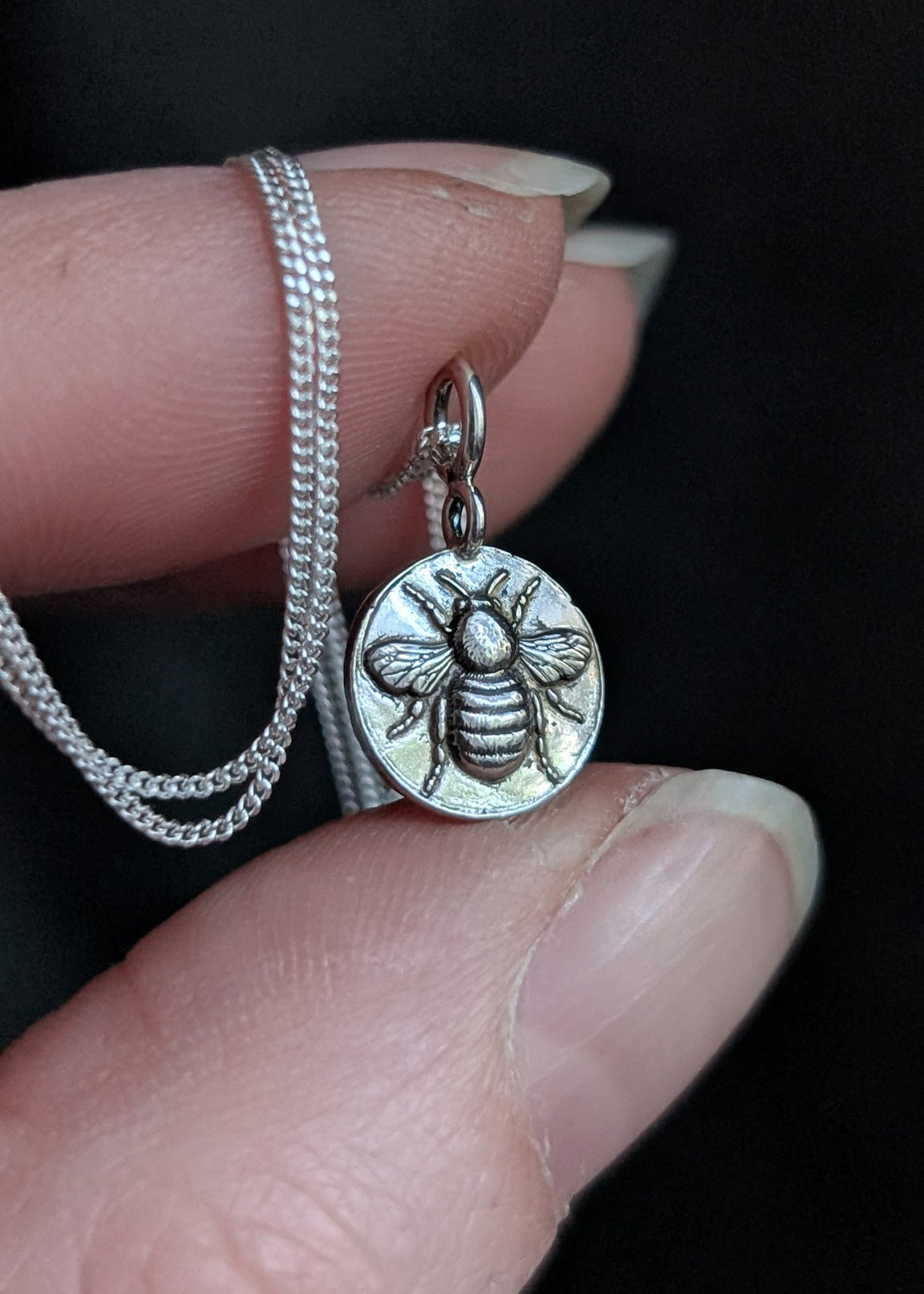 Tiny round bee pendant