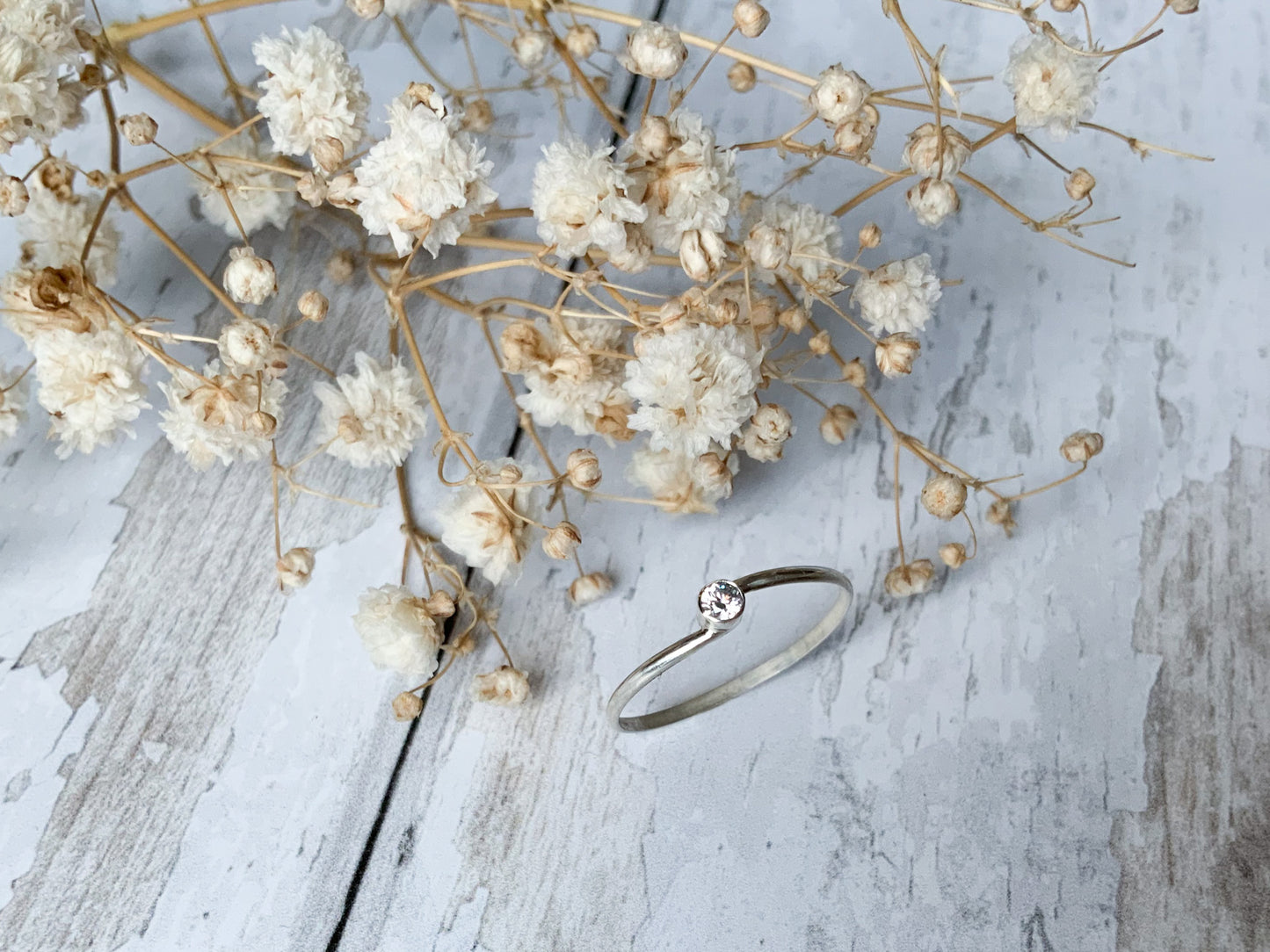 Dainty silver April birthstone ring