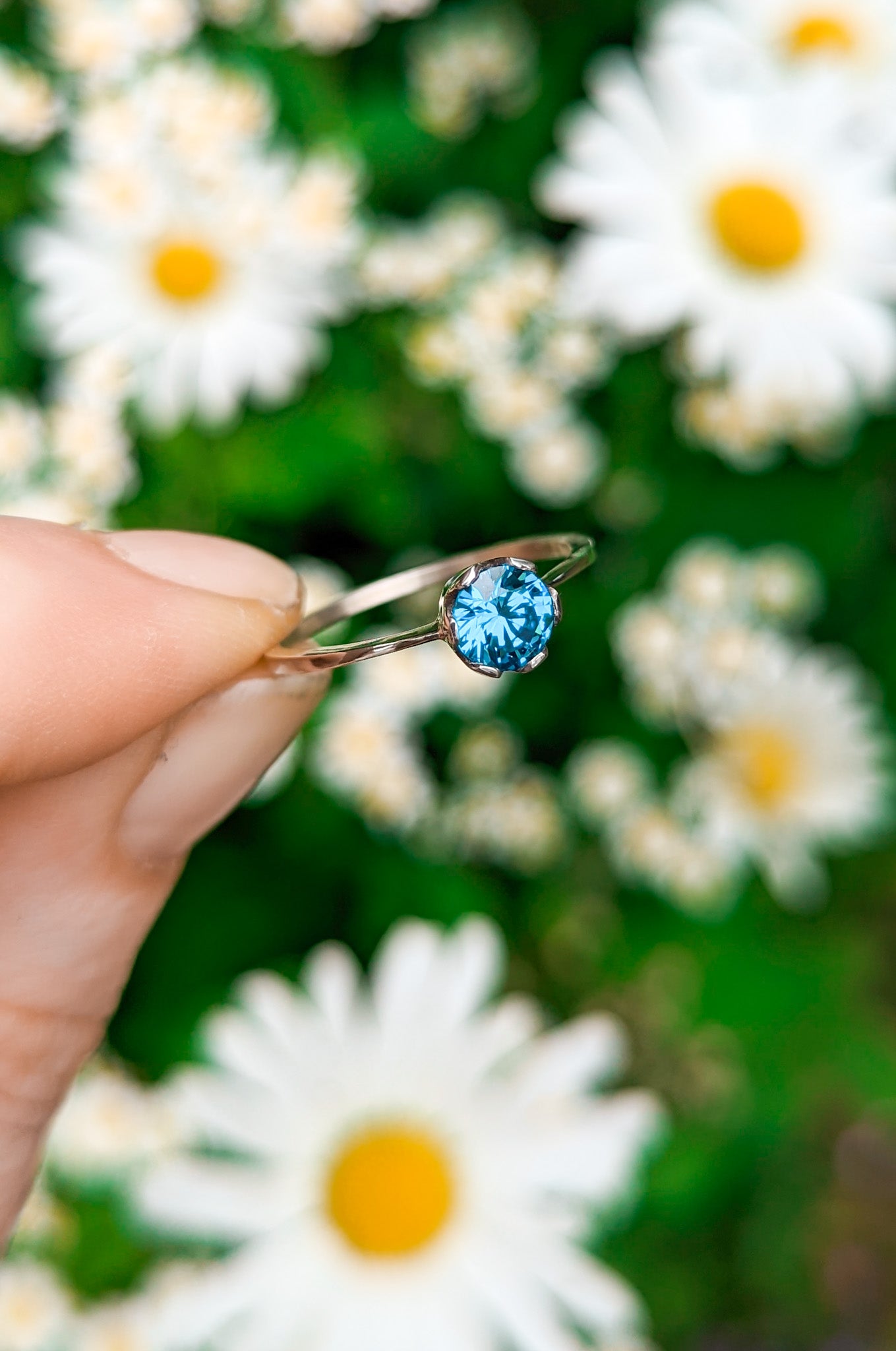 Vibrant blue solitaire ring UK size P