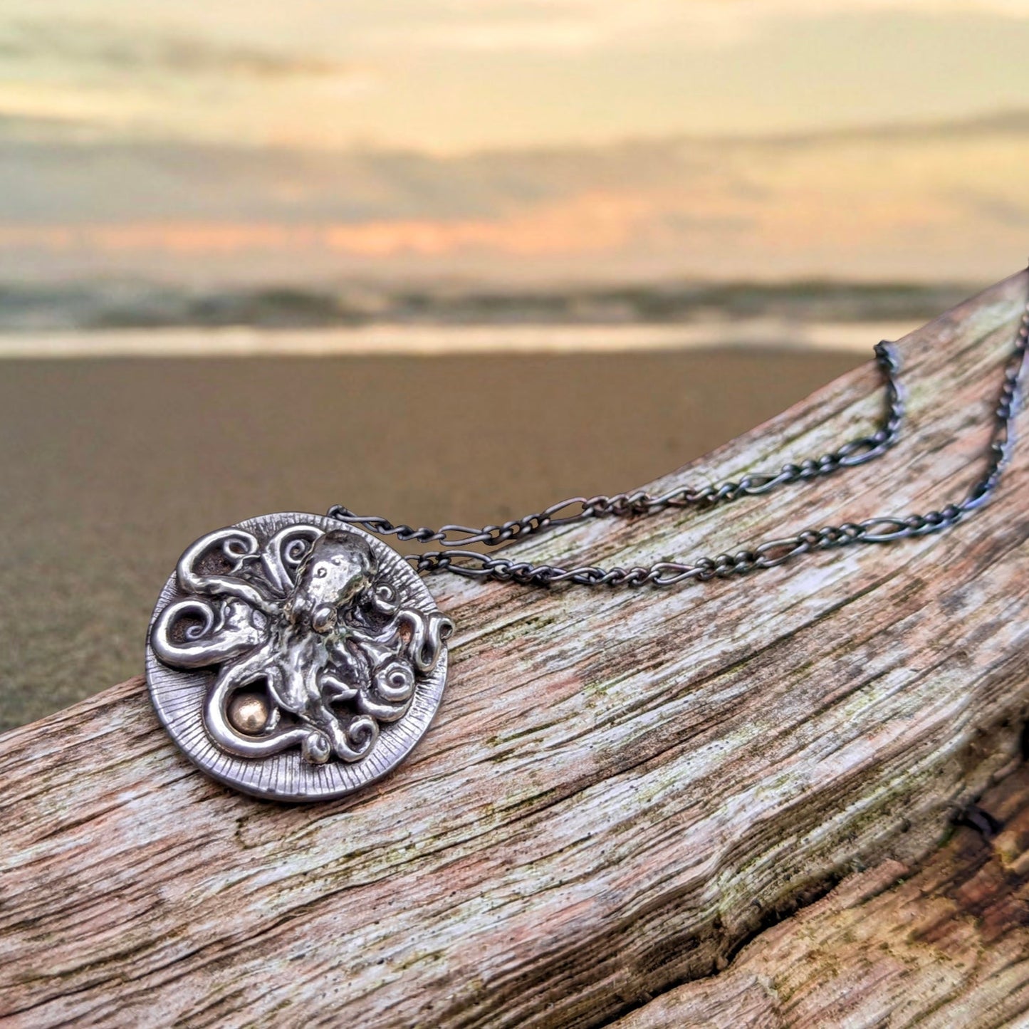 Silver and gold octopus pendant