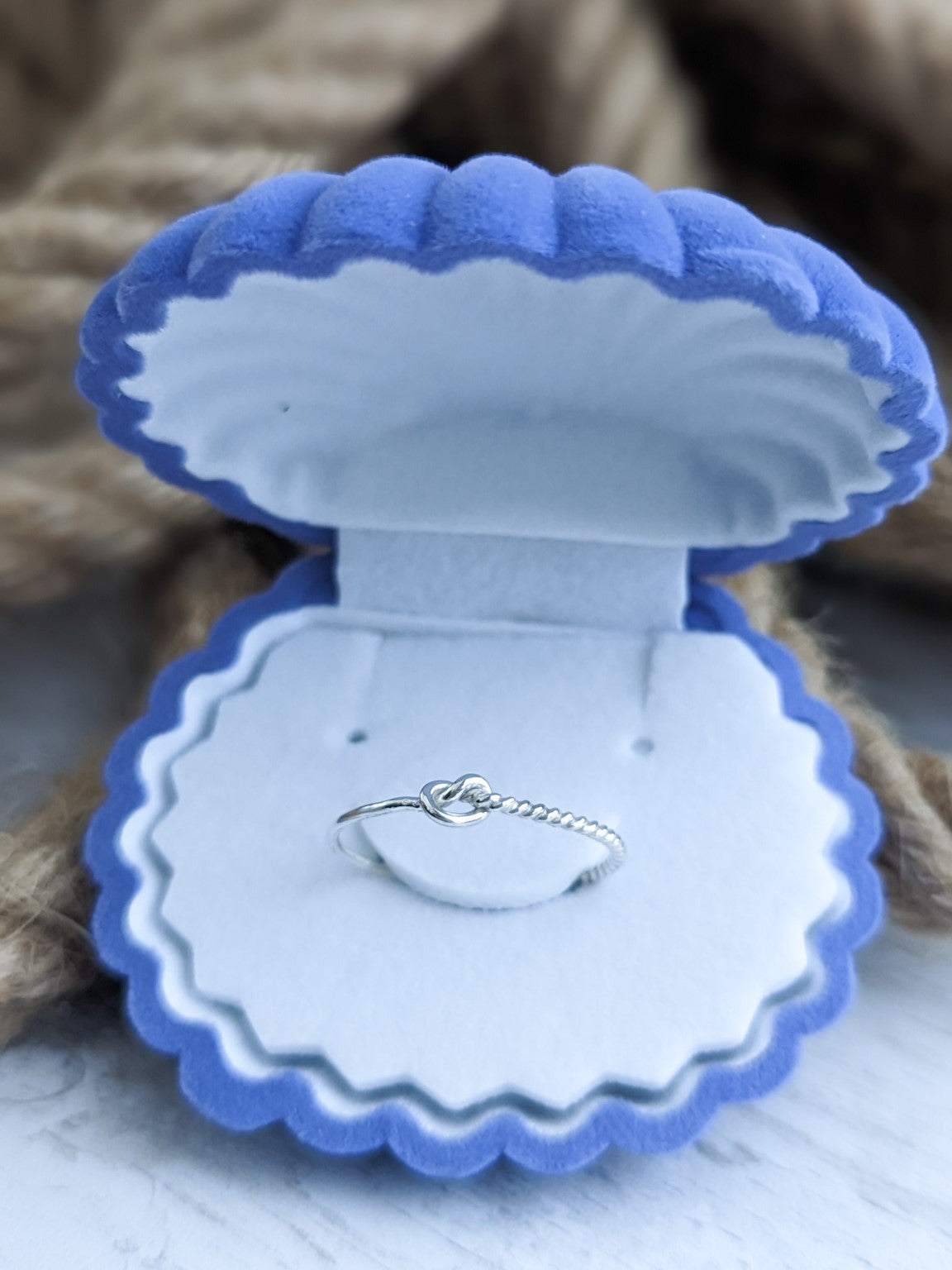 Silver rope ring overhand knot