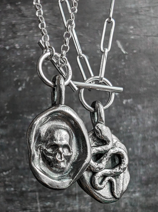 Double sided snake and skull silver necklace