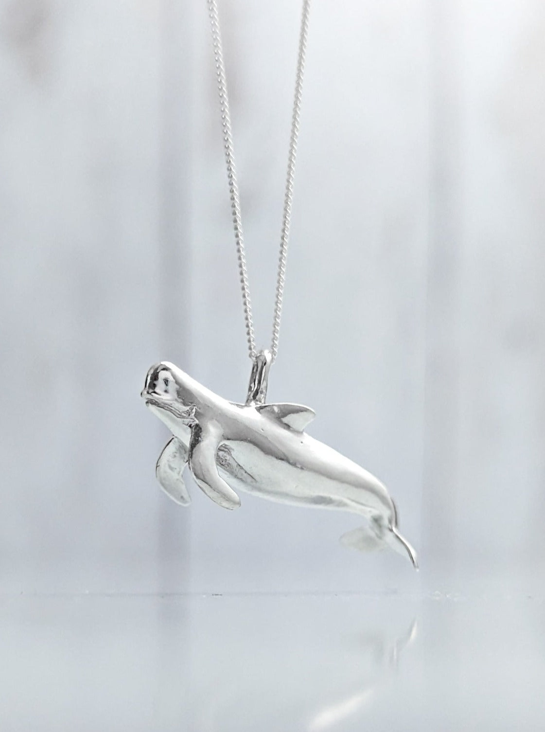 Realistic silver pilot whale necklace
