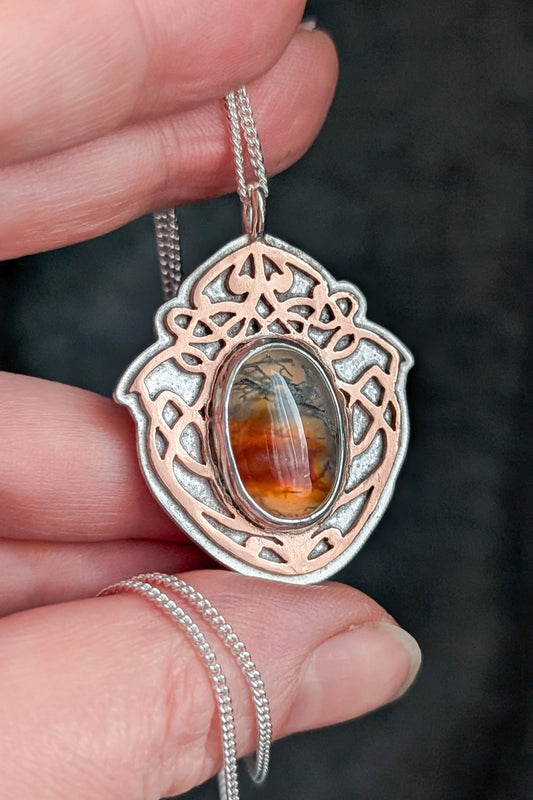 Scottish agate stone set in an intricate Celtic pattern