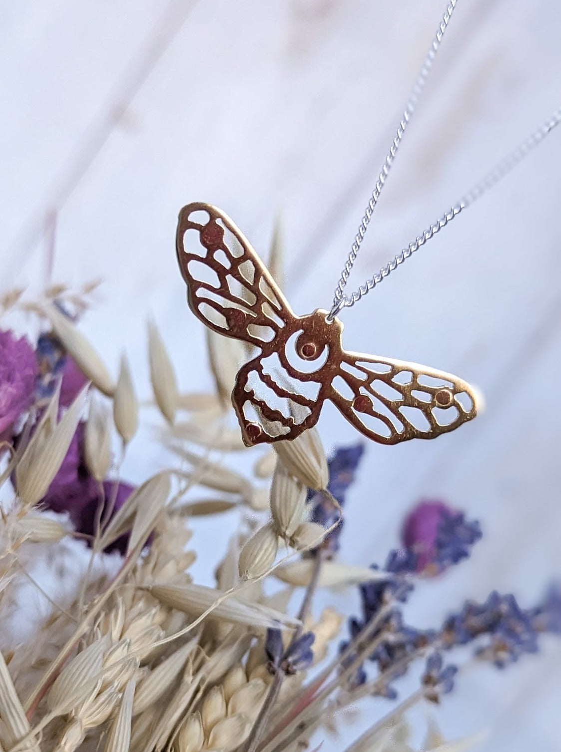 Gold bee cut-out pendant