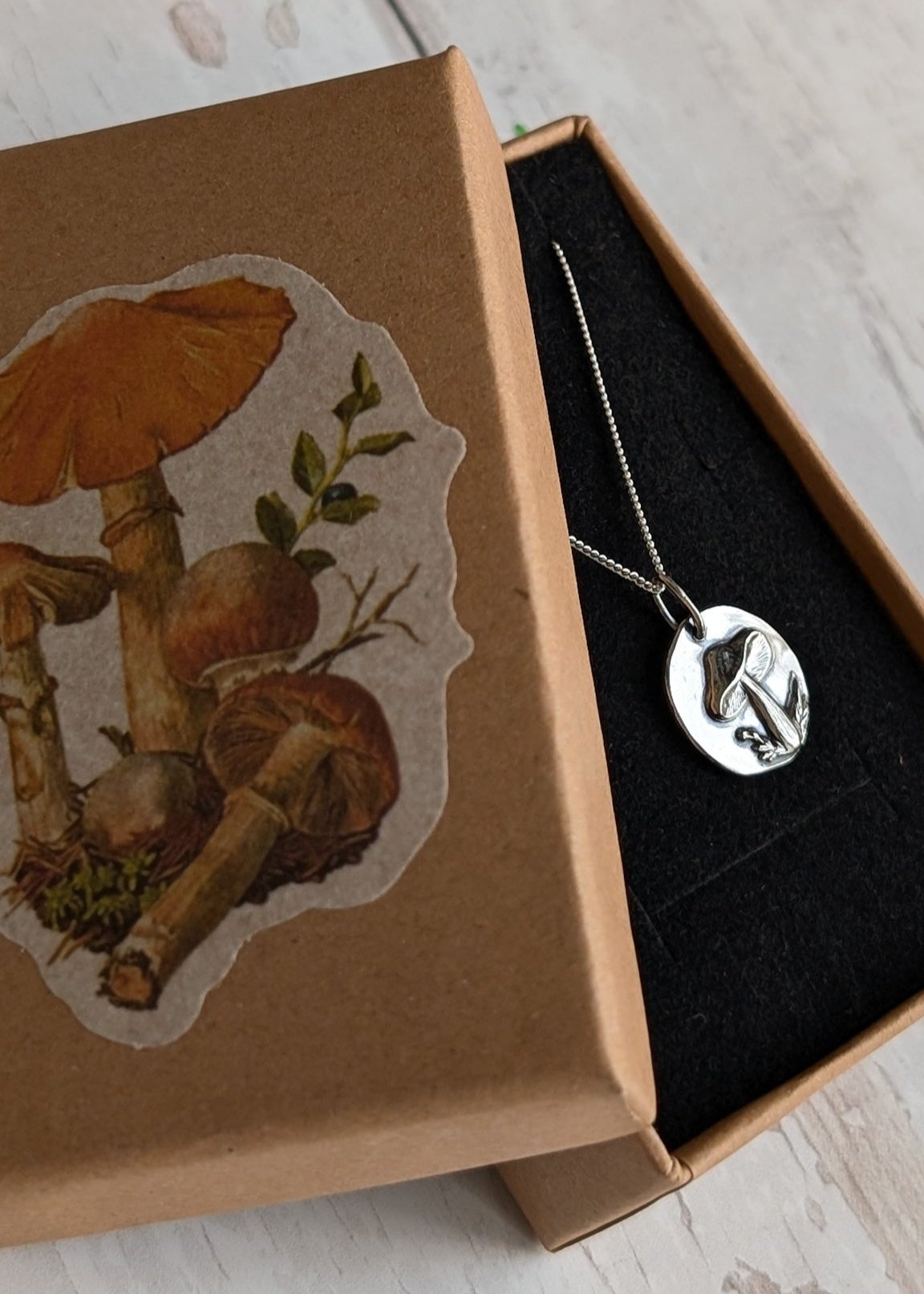 Handmade silver mushroom pendant in a woodland theme gift box