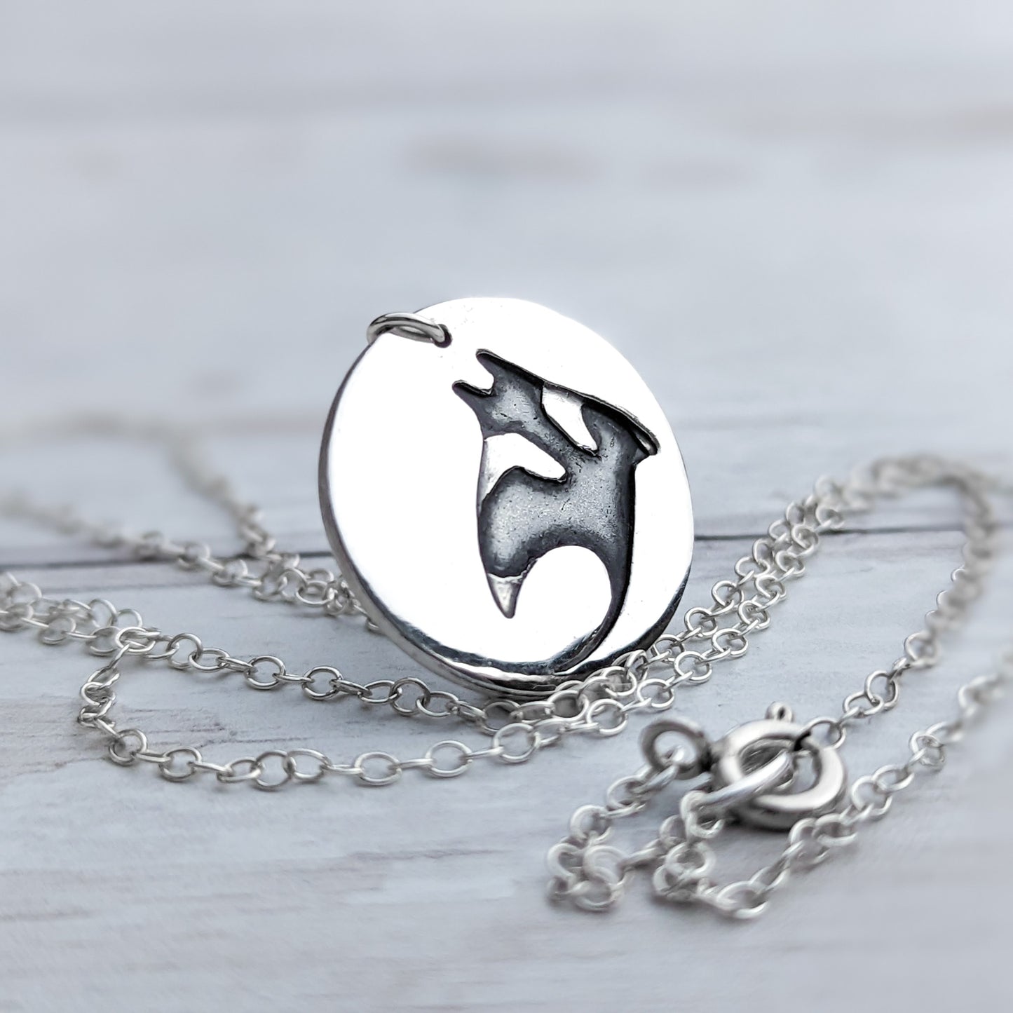 Silver disc manta ray pendant