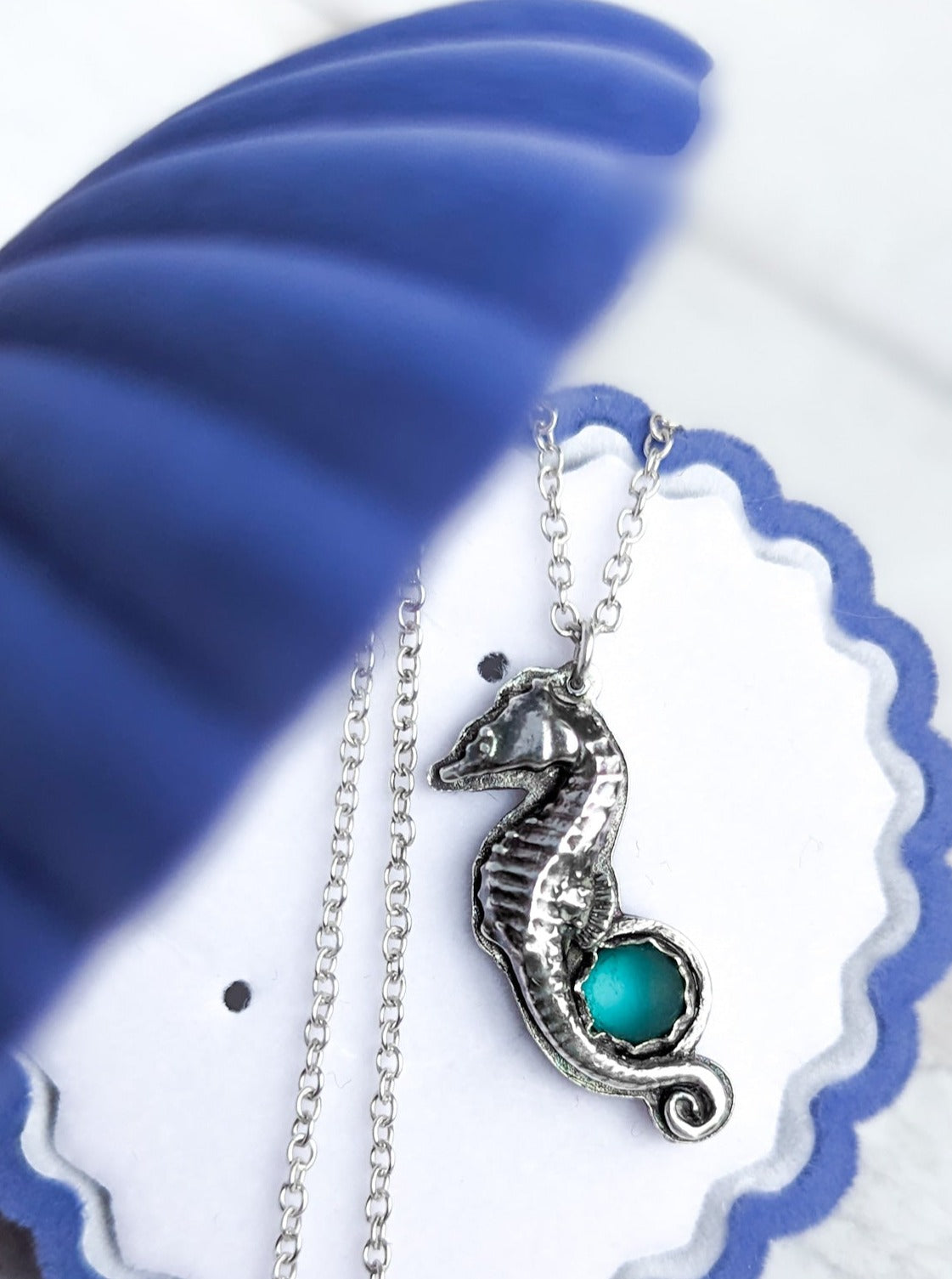 Darkened silver seahorse pendant with sea glass cabochon