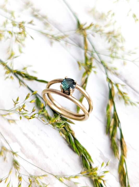 9ct gold double band engagement ring with teal sapphire
