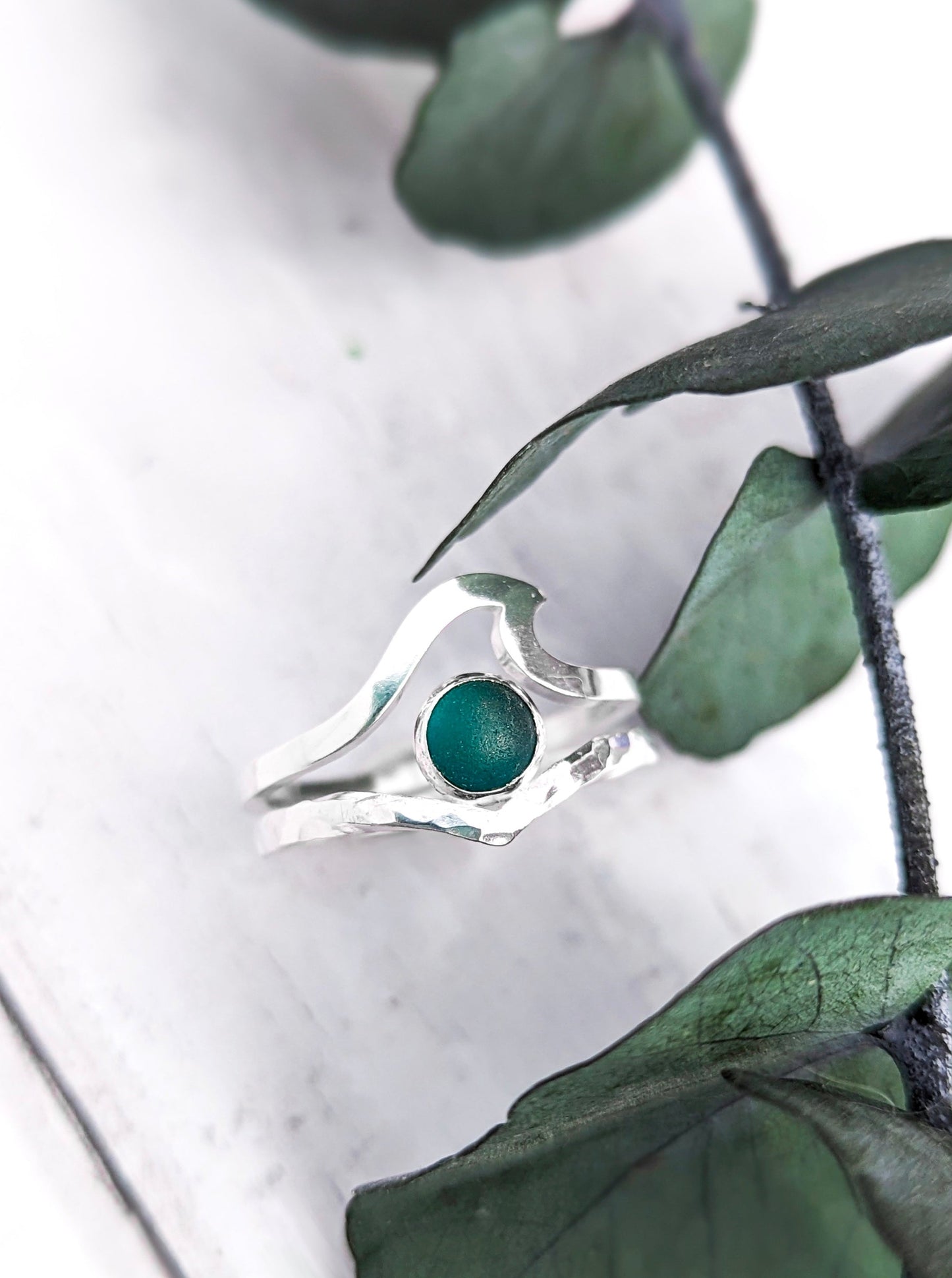 Sea glass cabochon ring stack with wishbone and wave ring