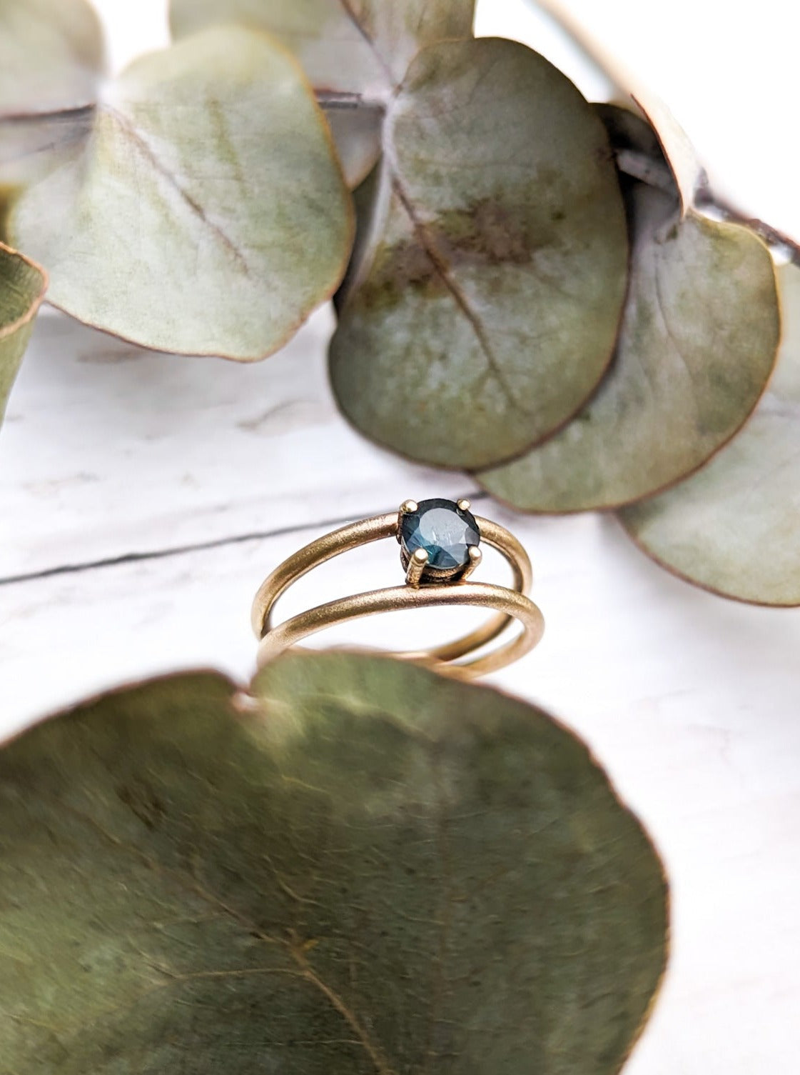 Teal sapphire solitaire ring