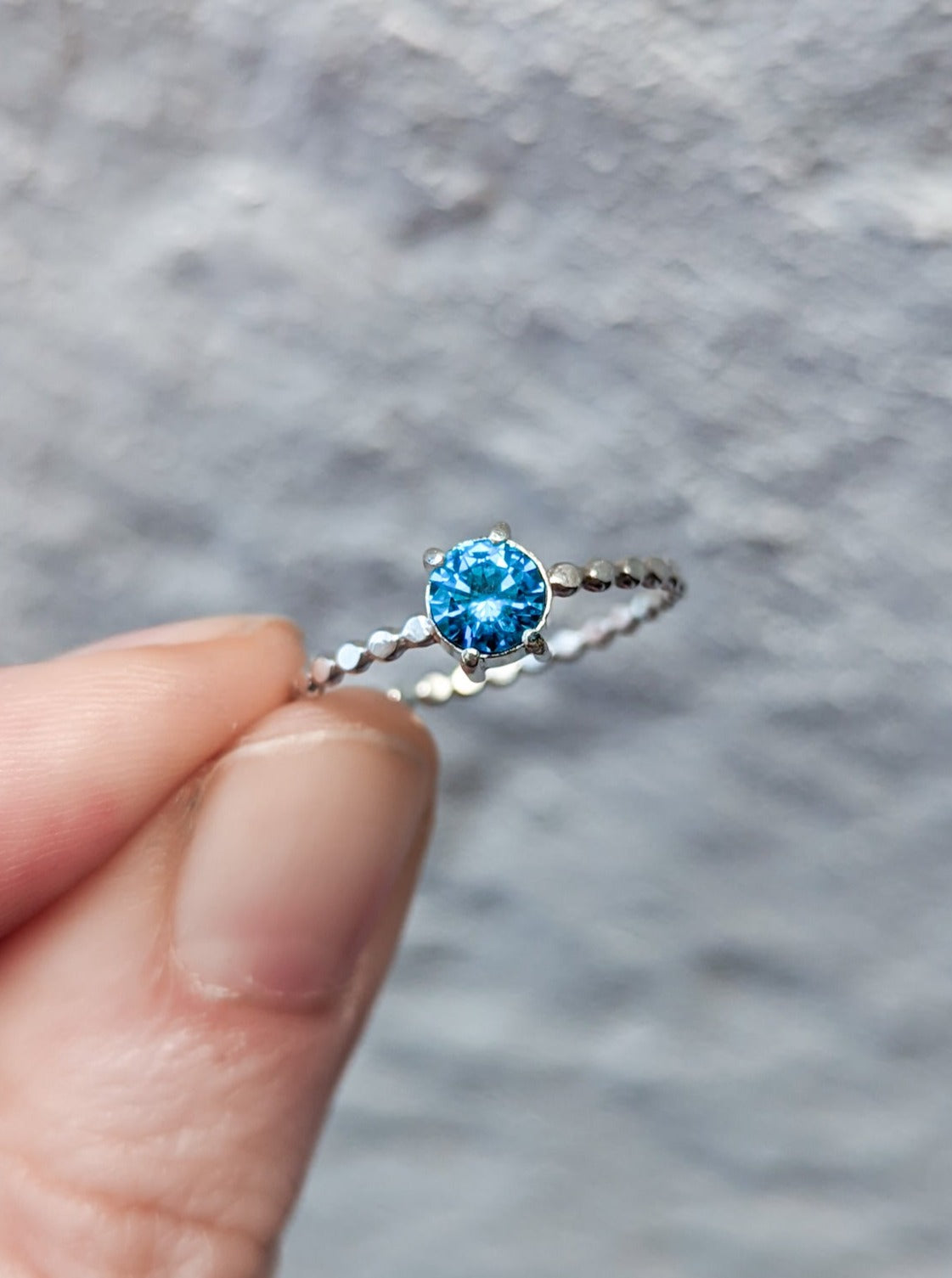 Blue zircon solitaire ring