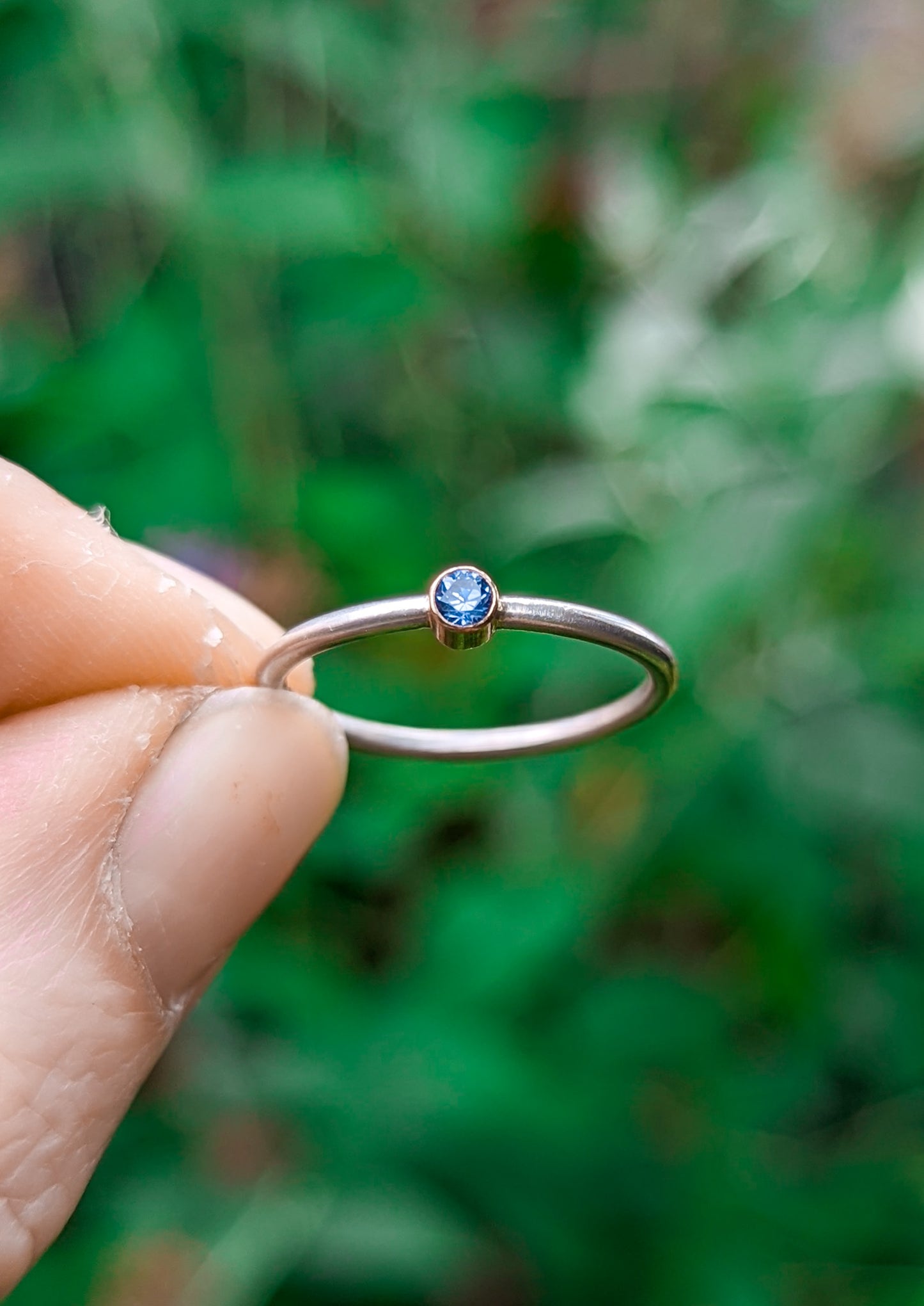 Stunning ocean blue stone solitaire ring