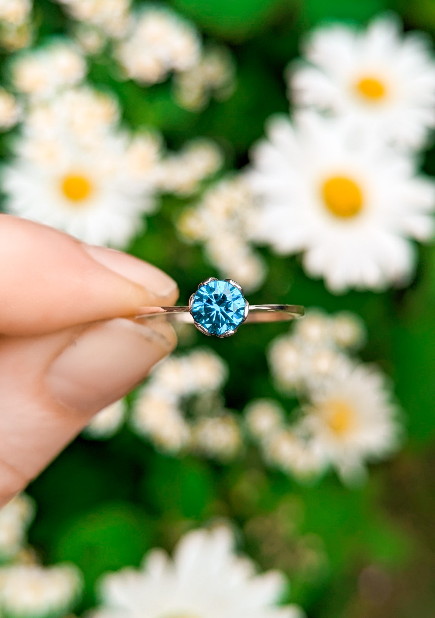 Vibrant blue solitaire ring UK size P