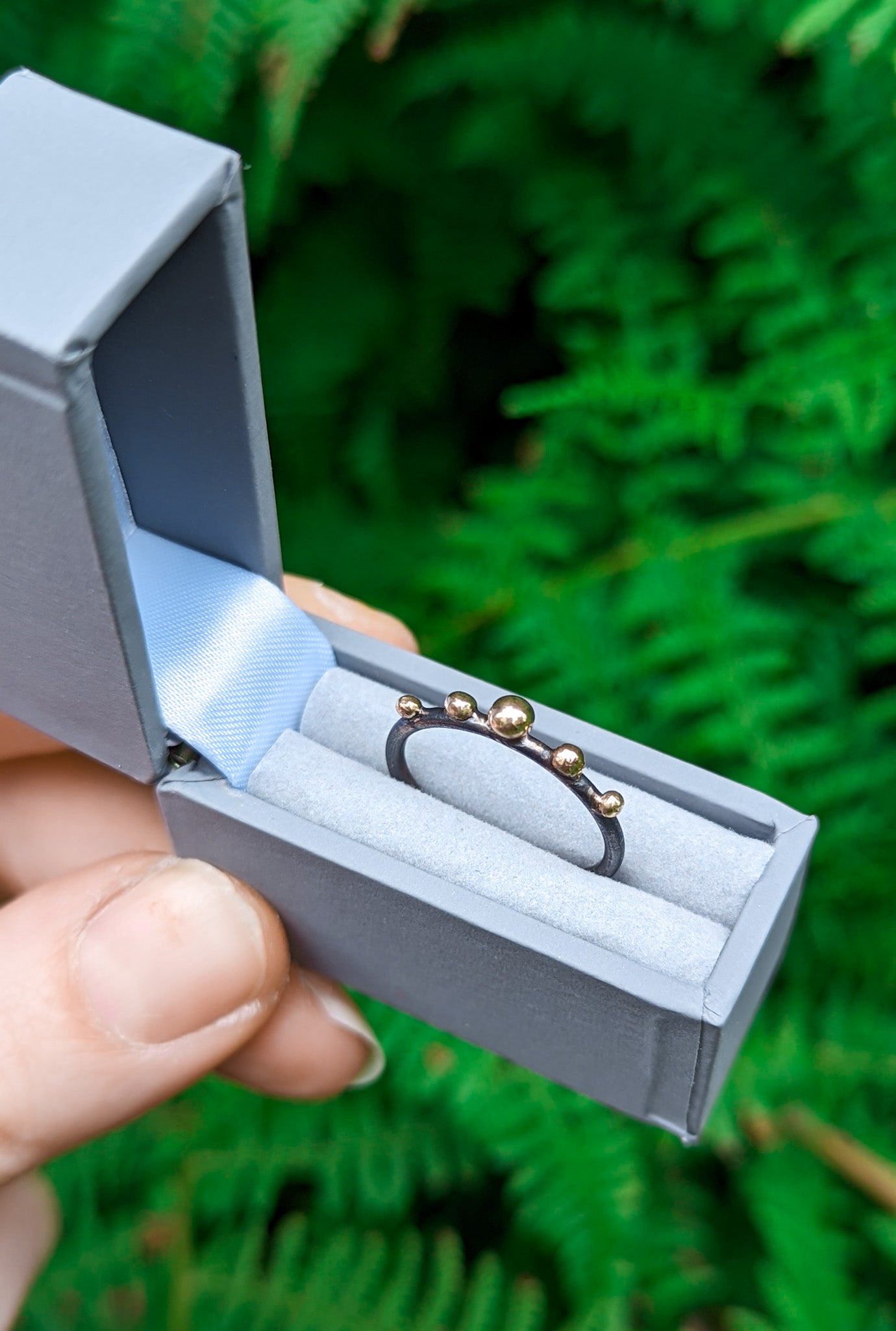 Gold bead ring in gift box