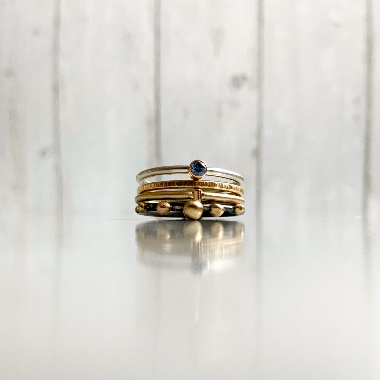 Silver and gold rings stack