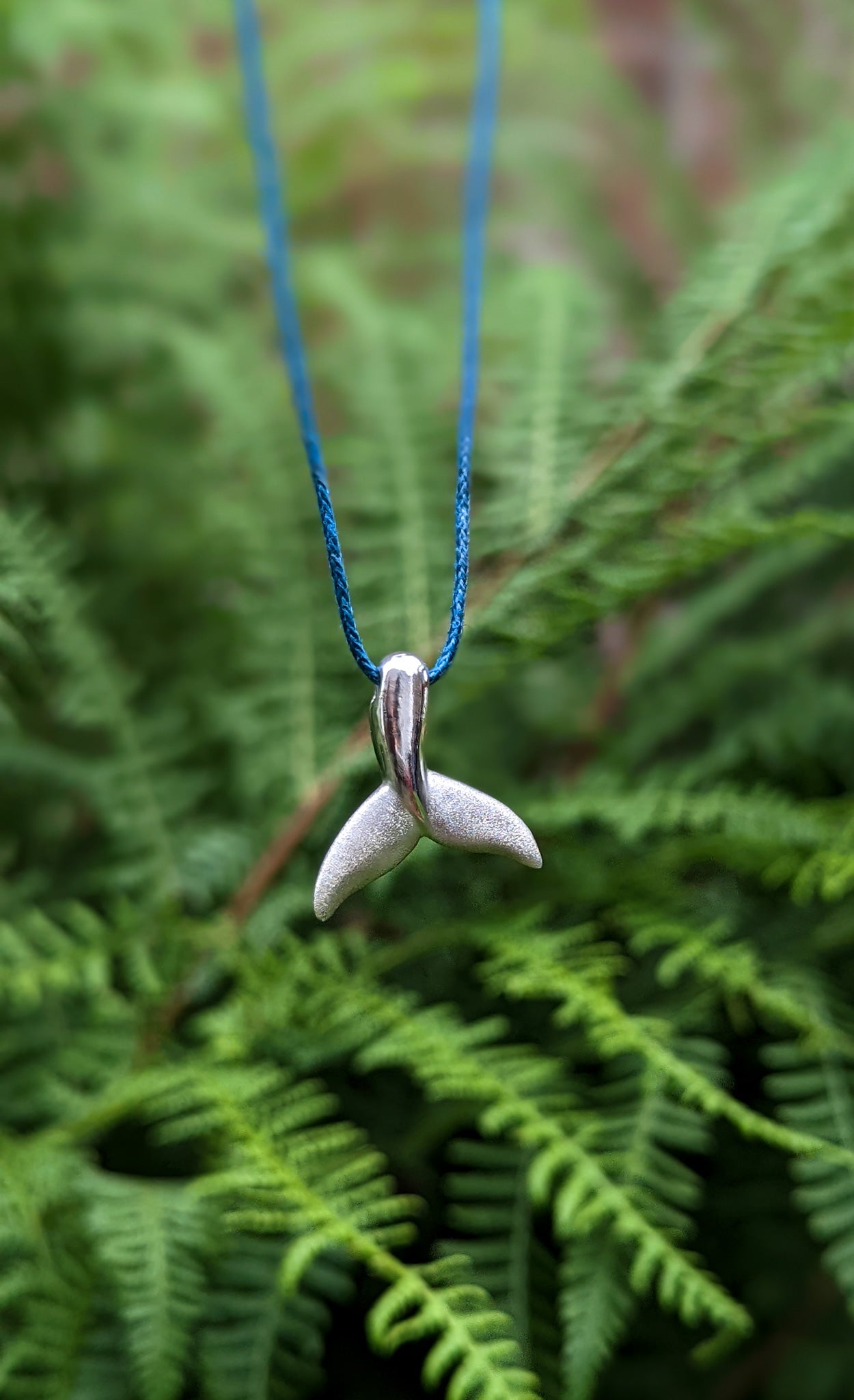Silver whale fluke necklace