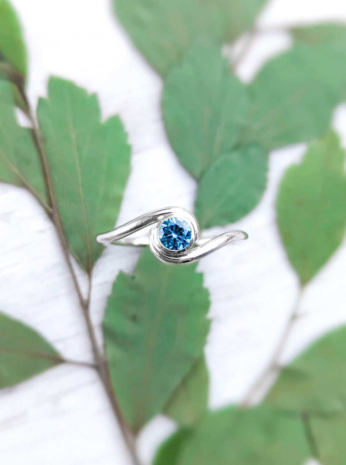 Ocean blue swirl wave ring