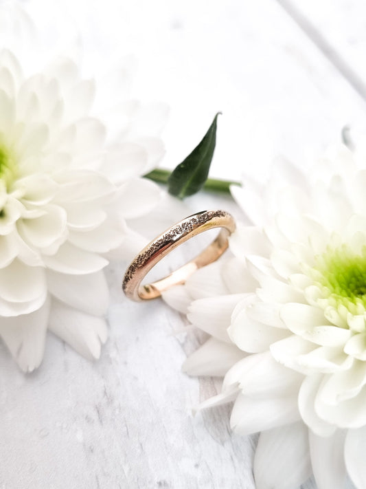 UK size N organic texture gold wedding ring for an outdoor wedding