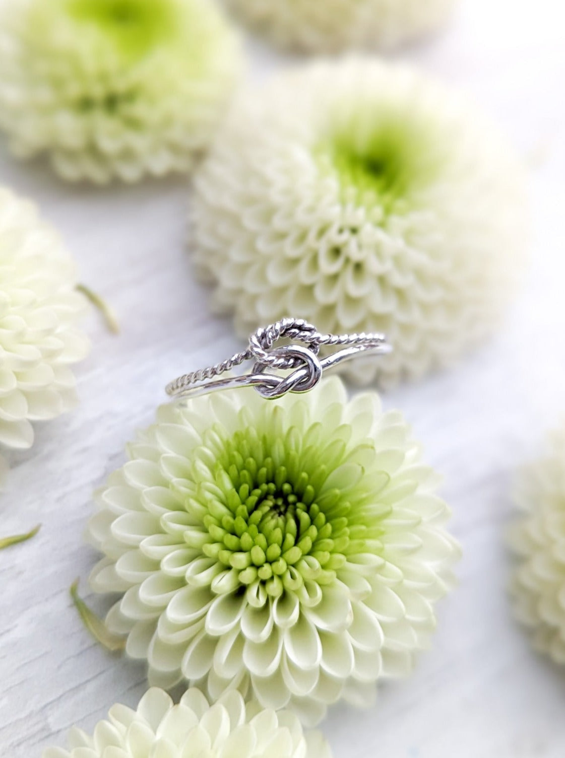 Elegant silver knot ring