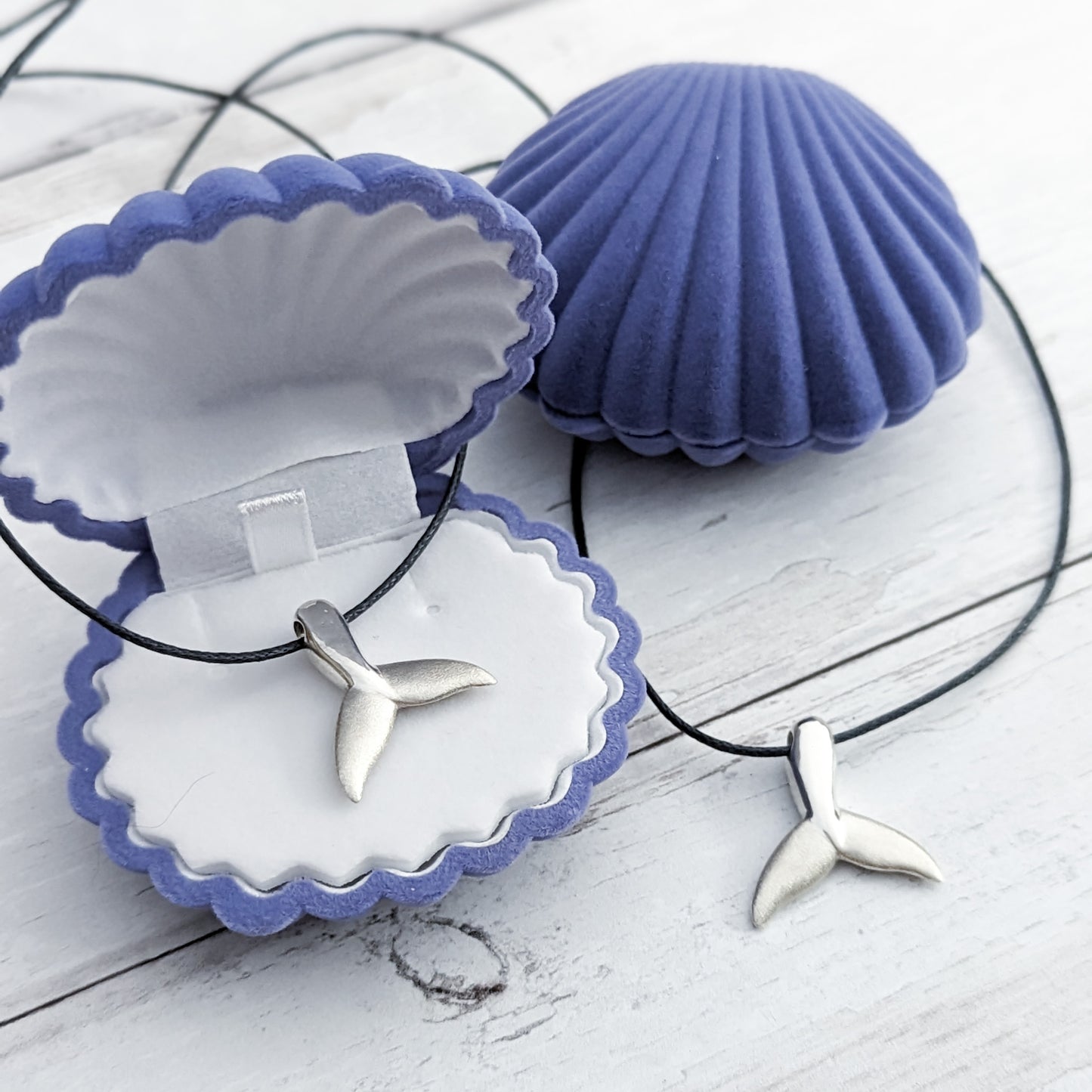 Silver whale tail pendants in shell gift box